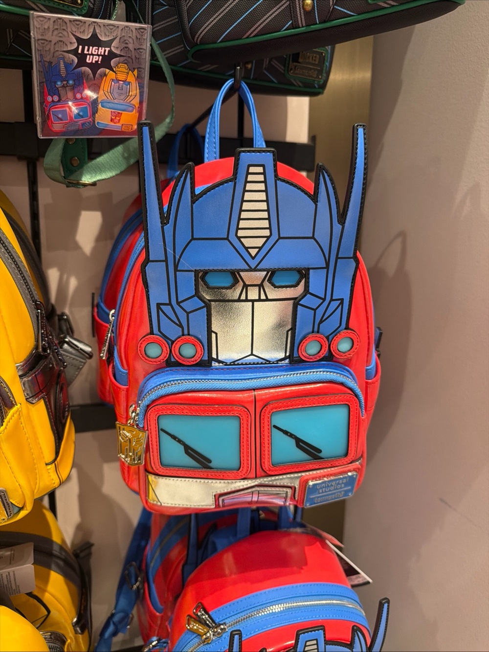 Loungefly Transformers Optimus
Prime Glow Cosplay Mini Backpack